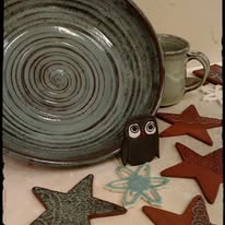 Gray bowl with barn owl figure and hand-built clay stars